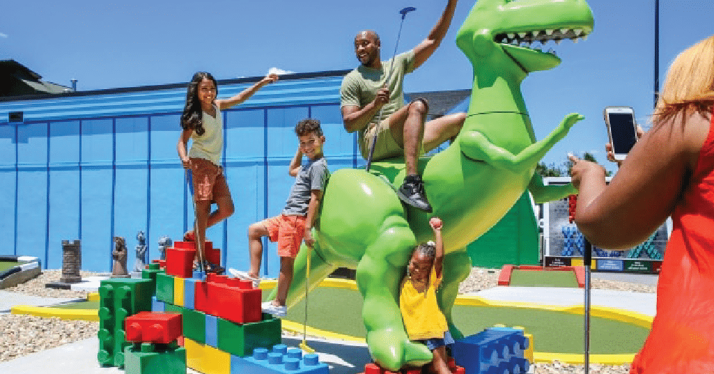 image of mini golf players at Toy box Mini Golf